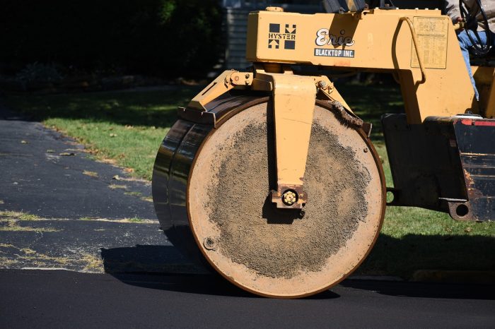 steamroller compressing bitumen